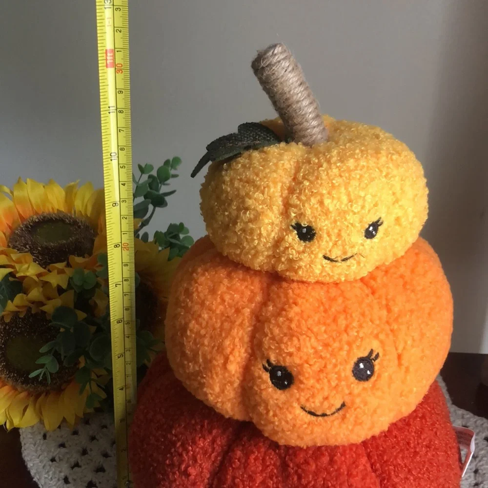 Stacked SHERPA Pumpkins with Smiley Faces